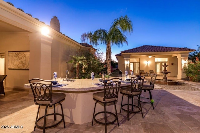 view of patio / terrace featuring french doors and exterior bar