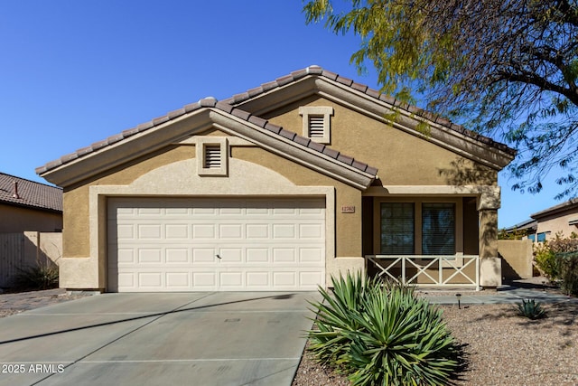 view of front of property featuring a garage