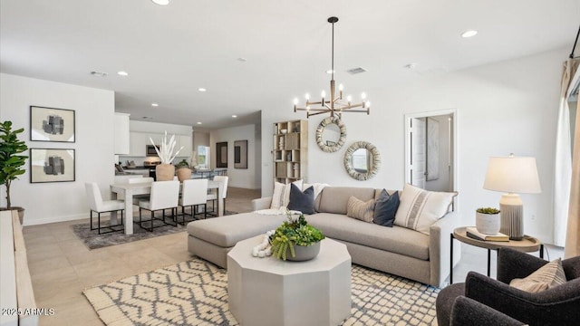 living area with a chandelier, light tile patterned floors, visible vents, and recessed lighting