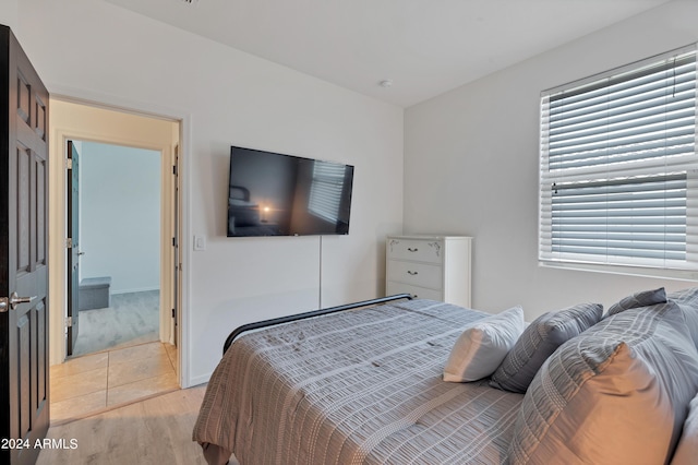 bedroom featuring light wood-type flooring