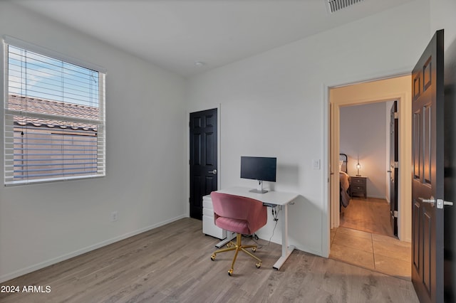 office area featuring light hardwood / wood-style floors