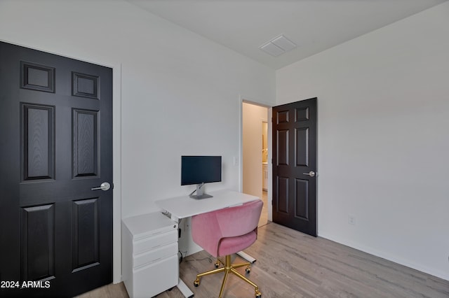 office area with light hardwood / wood-style flooring