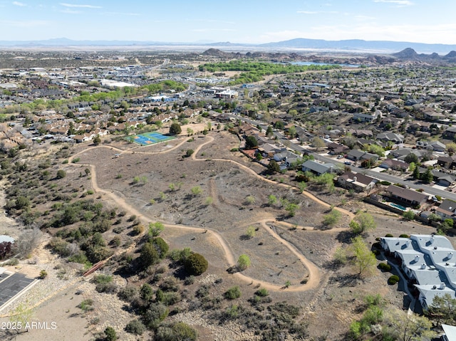 bird's eye view with a residential view and a mountain view