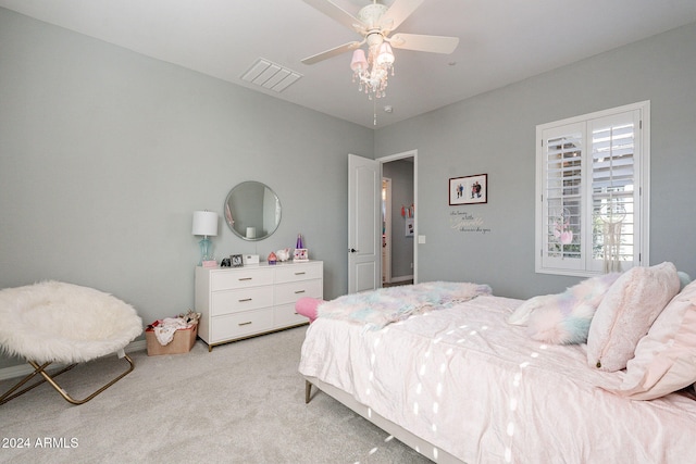 bedroom with ceiling fan and light colored carpet