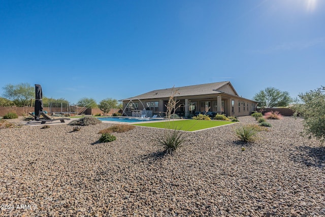 back of property featuring a patio area