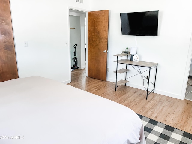 bedroom featuring light wood-type flooring