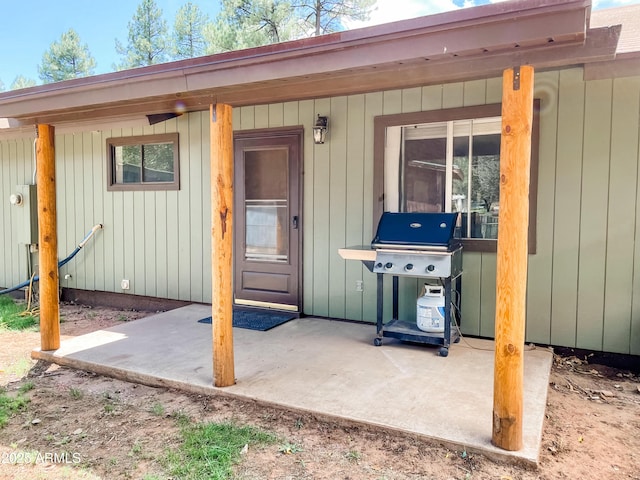 doorway to property featuring a patio