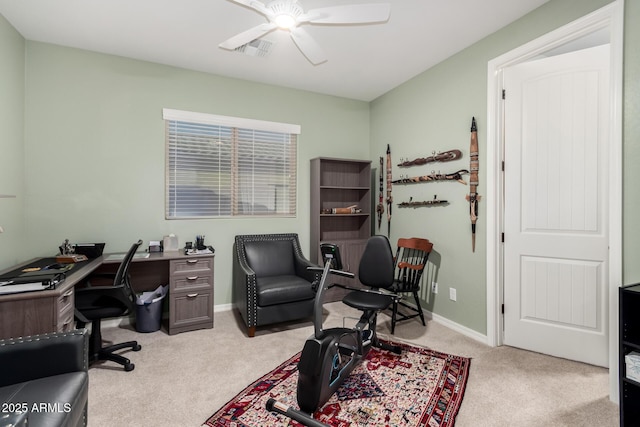 office with baseboards, light carpet, visible vents, and a ceiling fan