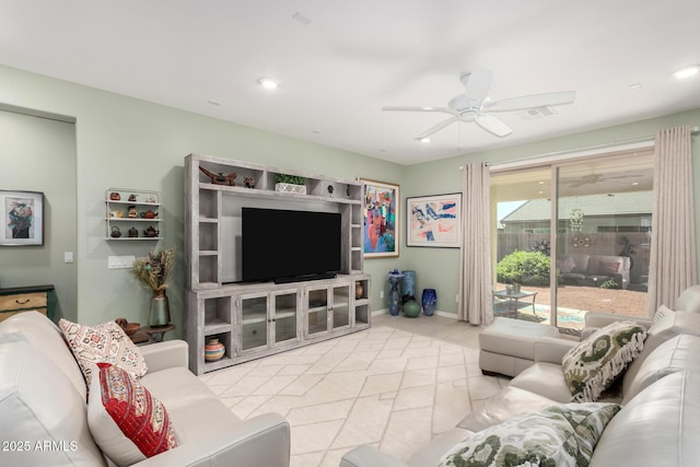 living room with recessed lighting, baseboards, and ceiling fan