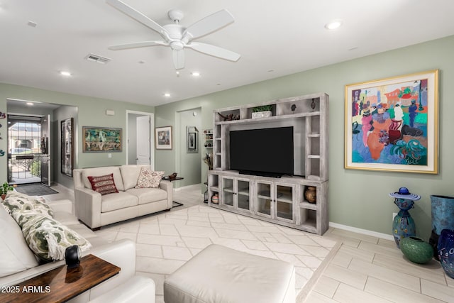 living area featuring recessed lighting, visible vents, and ceiling fan