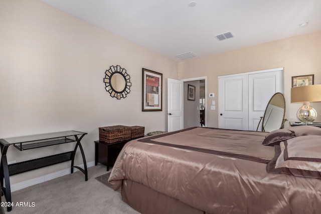 carpeted bedroom with billiards and a closet