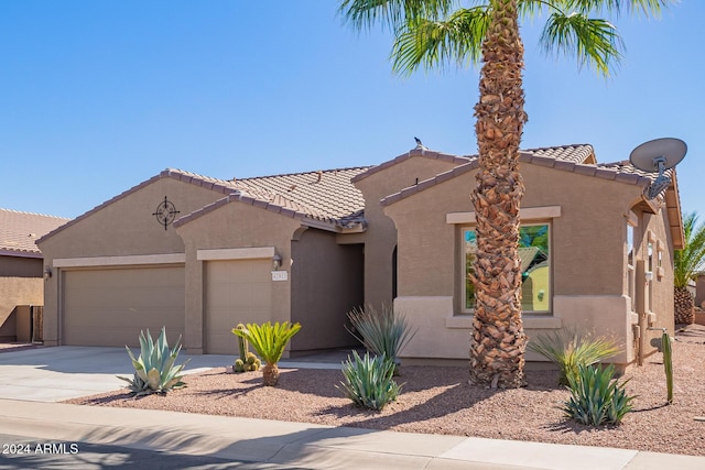42915 W Kingfisher Dr, Maricopa, AZ 85138 - mediterranean / spanish house with a garage, stucco siding, a tile roof, and concrete driveway