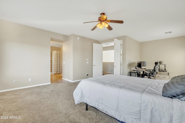 bedroom featuring light carpet and ceiling fan