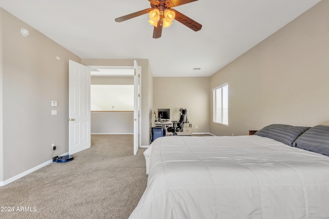 bedroom with light carpet and ceiling fan