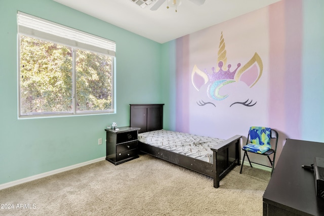 carpeted bedroom with ceiling fan