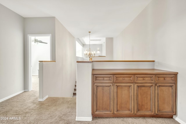 14462 W Avalon Dr, Goodyear, AZ 85395 - hall with carpet, an upstairs landing, and a chandelier