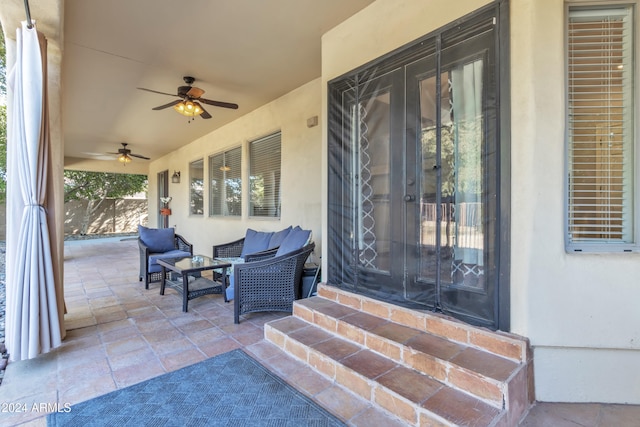 doorway to property featuring ceiling fan and a patio area