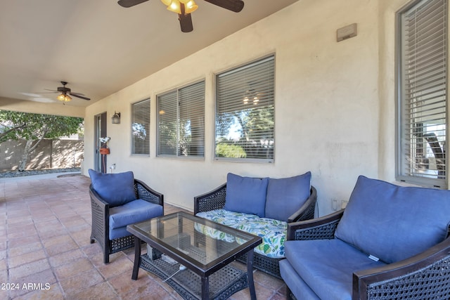 view of patio featuring outdoor lounge area and ceiling fan