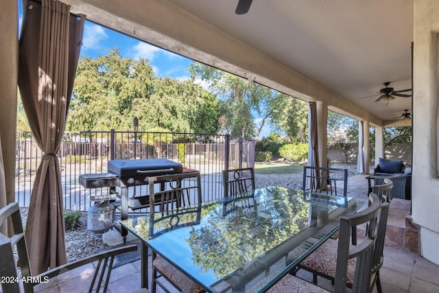 view of patio / terrace featuring ceiling fan