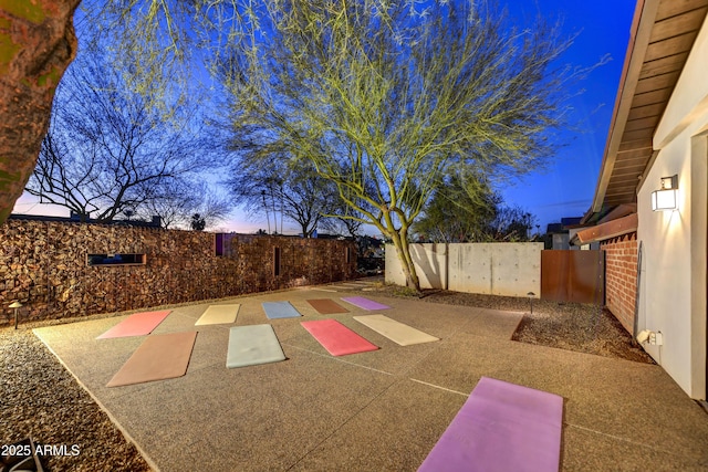 exterior space with a fenced backyard