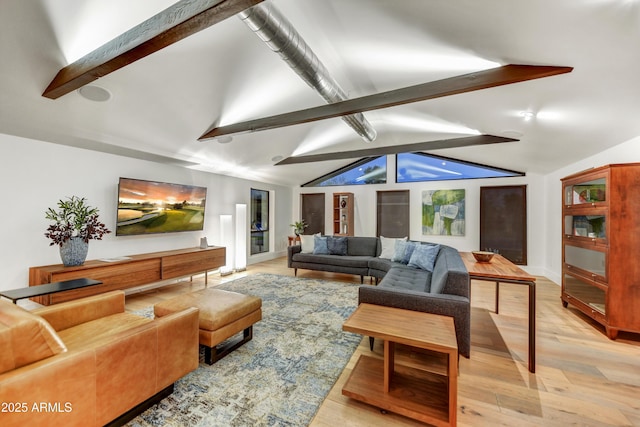 living room with baseboards, vaulted ceiling with beams, and light wood-style floors