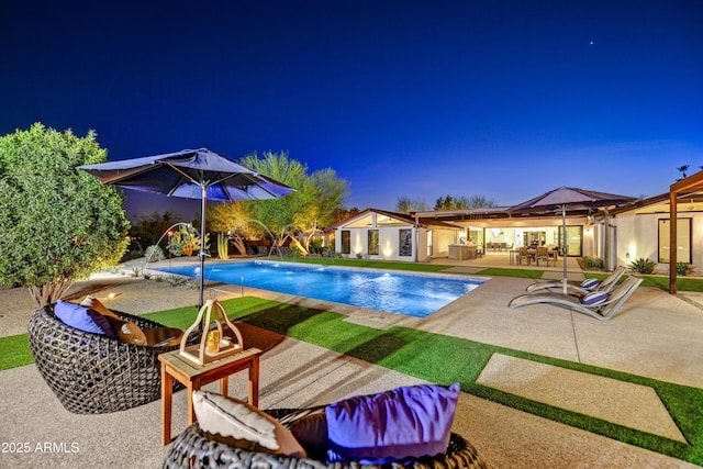 pool featuring a patio area