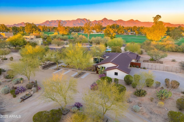 aerial view at dusk with a mountain view