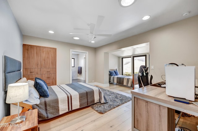 bedroom with recessed lighting, light wood-type flooring, a ceiling fan, and ensuite bathroom