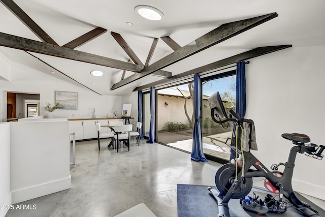 workout room with recessed lighting, baseboards, and vaulted ceiling