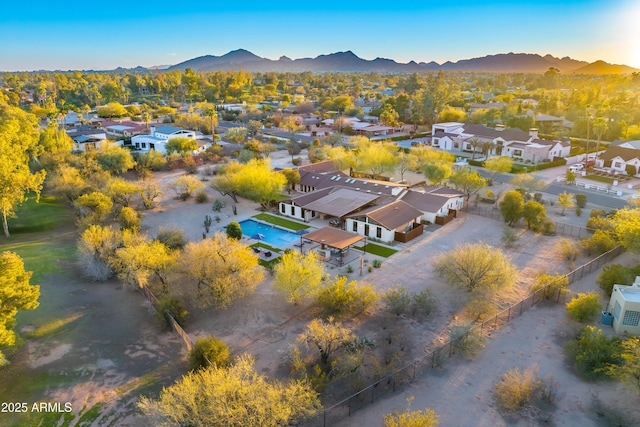 drone / aerial view with a residential view and a mountain view