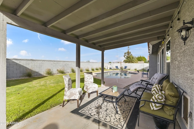 view of patio / terrace featuring a fenced backyard and a fenced in pool