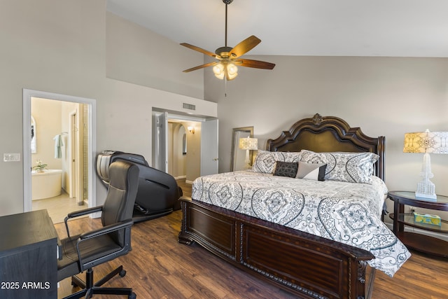 bedroom with high vaulted ceiling, connected bathroom, wood finished floors, a ceiling fan, and visible vents