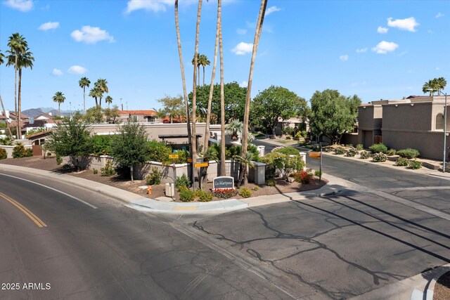 7565 N Via De La Siesta, Scottsdale, AZ 85258 - view of asphalt street featuring a residential view and sidewalks
