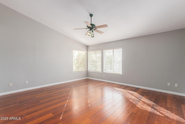 21 E Irvine Rd, Phoenix, AZ 85086 - unfurnished room with ceiling fan, vaulted ceiling, and wood finished floors