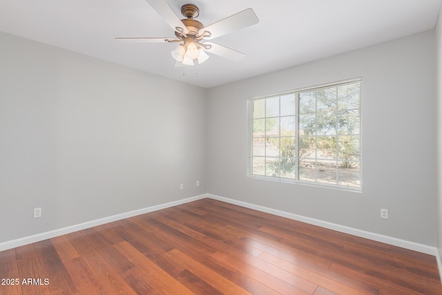 21 E Irvine Rd, Phoenix, AZ 85086 - spare room with a ceiling fan and wood finished floors