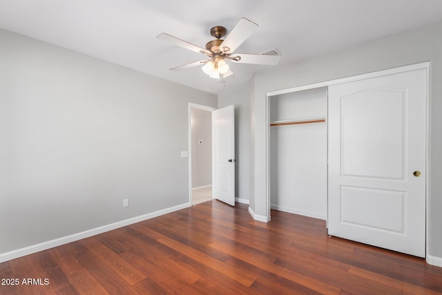 21 E Irvine Rd, Phoenix, AZ 85086 - unfurnished bedroom with wood finished floors, a closet, and a ceiling fan