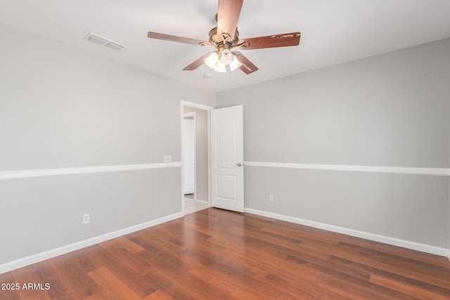 21 E Irvine Rd, Phoenix, AZ 85086 - spare room with ceiling fan and wood finished floors