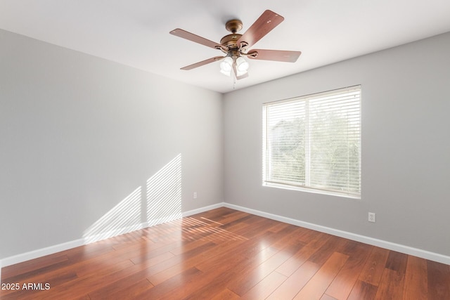 21 E Irvine Rd, Phoenix, AZ 85086 - spare room featuring ceiling fan and wood finished floors