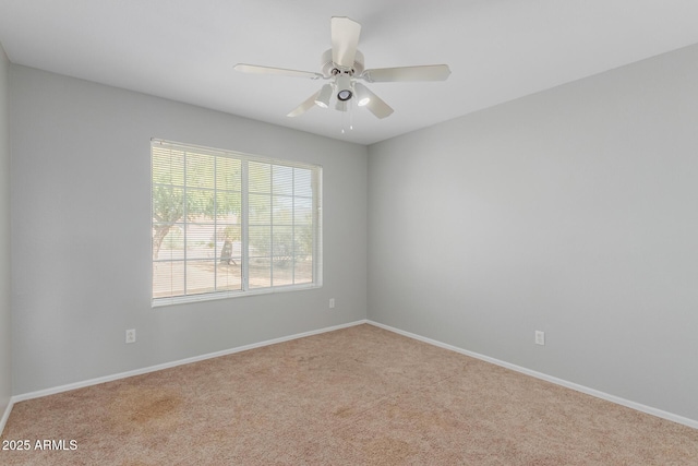 21 E Irvine Rd, Phoenix, AZ 85086 - carpeted spare room featuring ceiling fan and baseboards