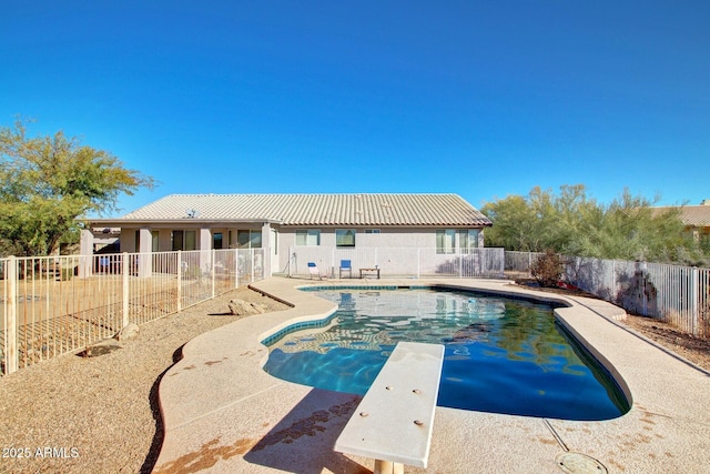 21 E Irvine Rd, Phoenix, AZ 85086 - view of swimming pool with a patio, a fenced backyard, and a diving board