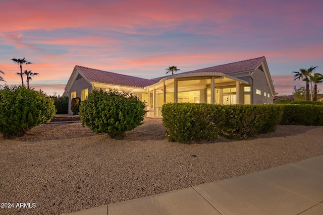 view of property exterior at dusk