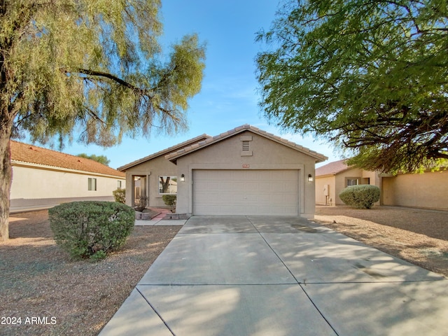 ranch-style house with a garage