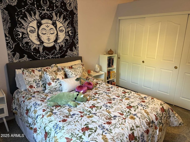 carpeted bedroom featuring a closet