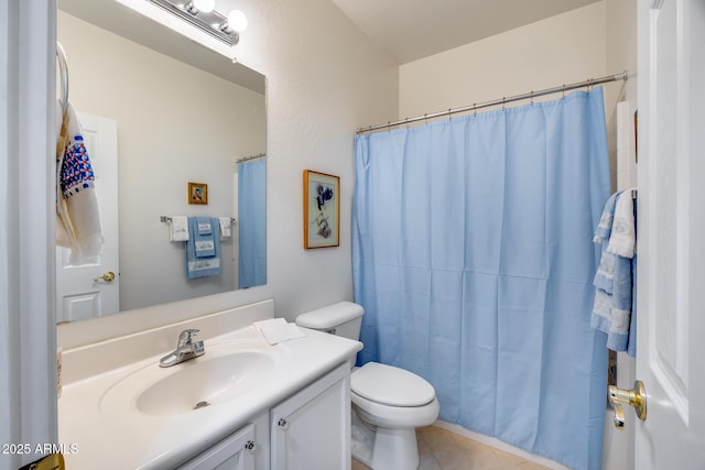 full bath featuring tile patterned flooring, toilet, and vanity