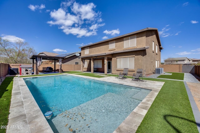 view of pool with a gazebo, cooling unit, a patio, and a fenced backyard