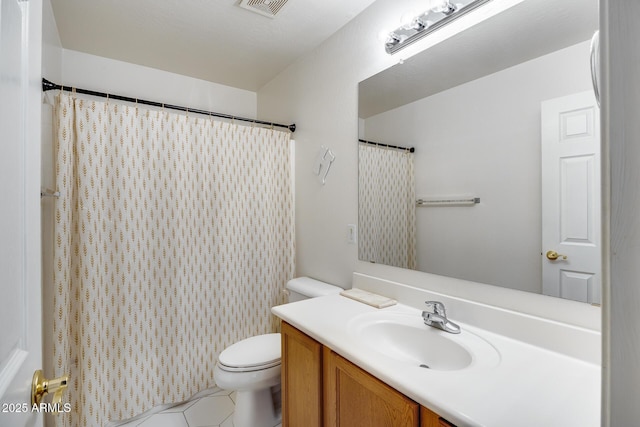 full bath with visible vents, toilet, vanity, and tile patterned flooring