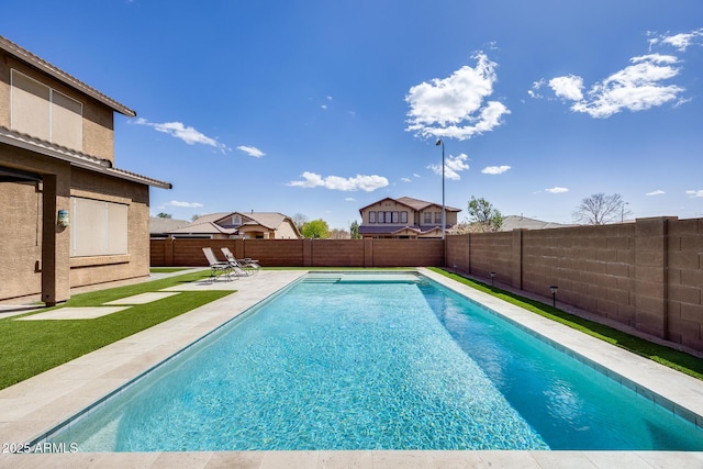 view of swimming pool with a patio, a fenced backyard, and a fenced in pool