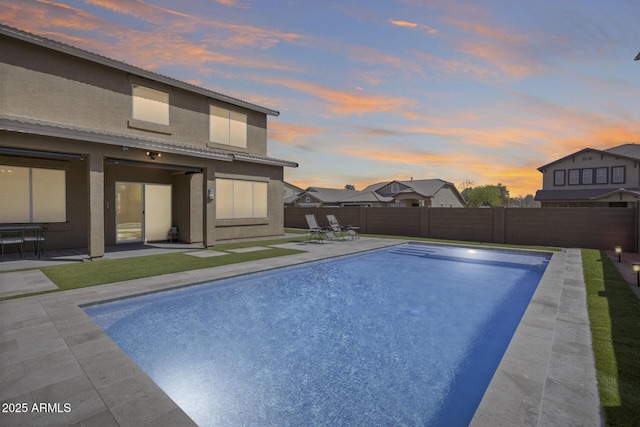 view of pool with a fenced backyard, a fenced in pool, and a patio