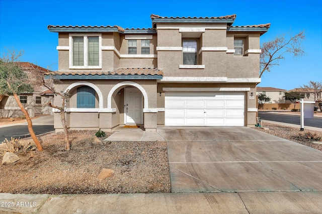 view of front of property with a garage