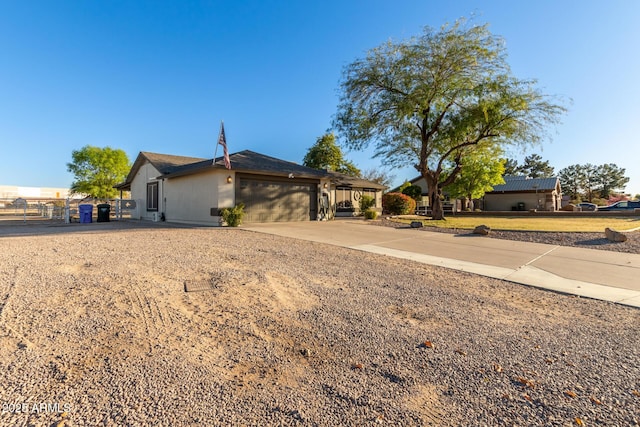 single story home featuring a garage